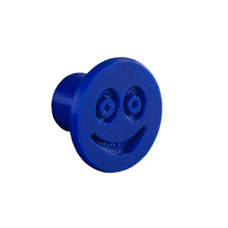 Flexible furniture knob with smile, navy blue, without background.