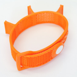 Orange tool-band coiled into a loop.